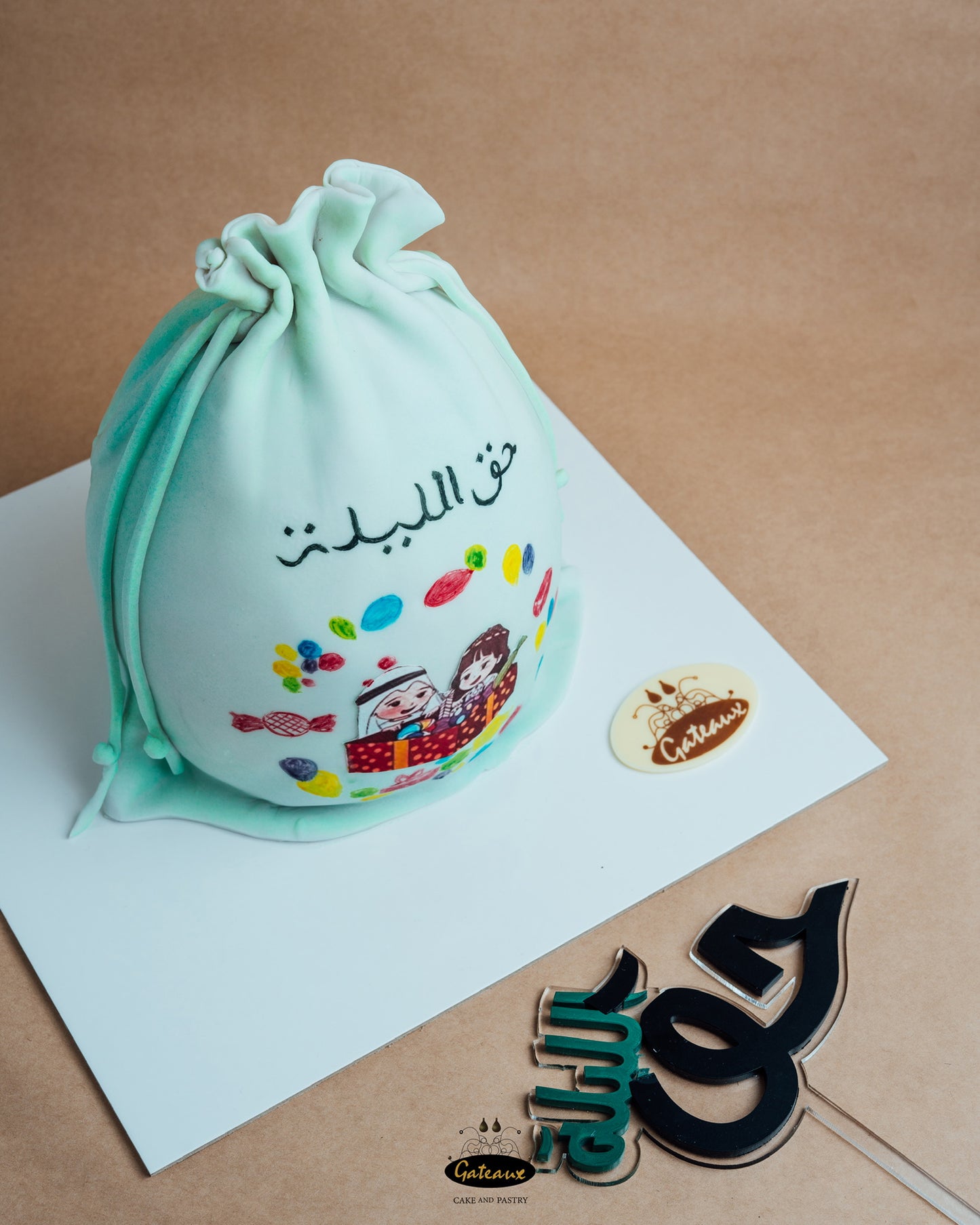 Hag al laila bag Cake